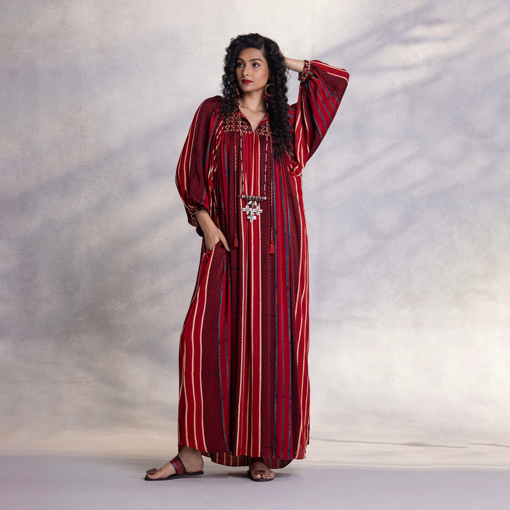 Kimono-style dress with dori ties and tassel accents
