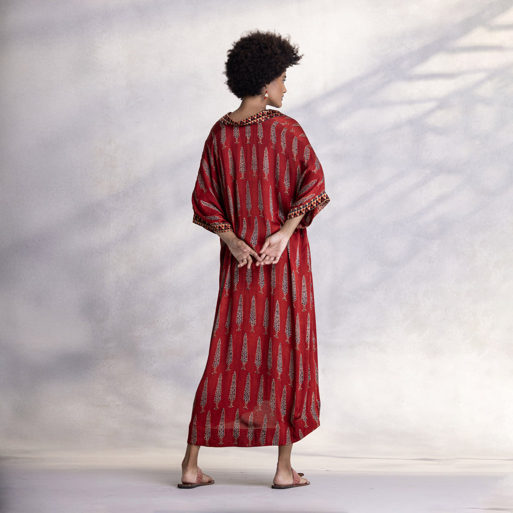 Modal satin dress showing fluid silhouette and soft drape
