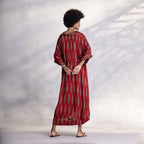 Modal satin dress showing fluid silhouette and soft drape
