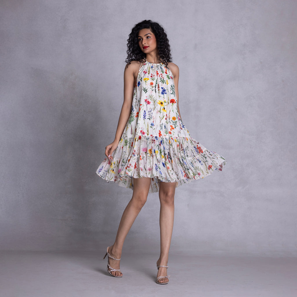 Halter dress with beaded embroidery and tassel detailing

