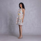 Cambric and georgette dress with ruffle hem and side pockets
