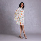 Cambric and georgette dress with shell button keyhole detail
