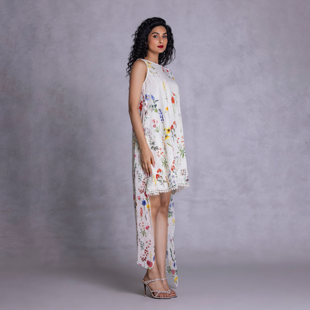 Cambric and georgette dress with fluid silhouette
