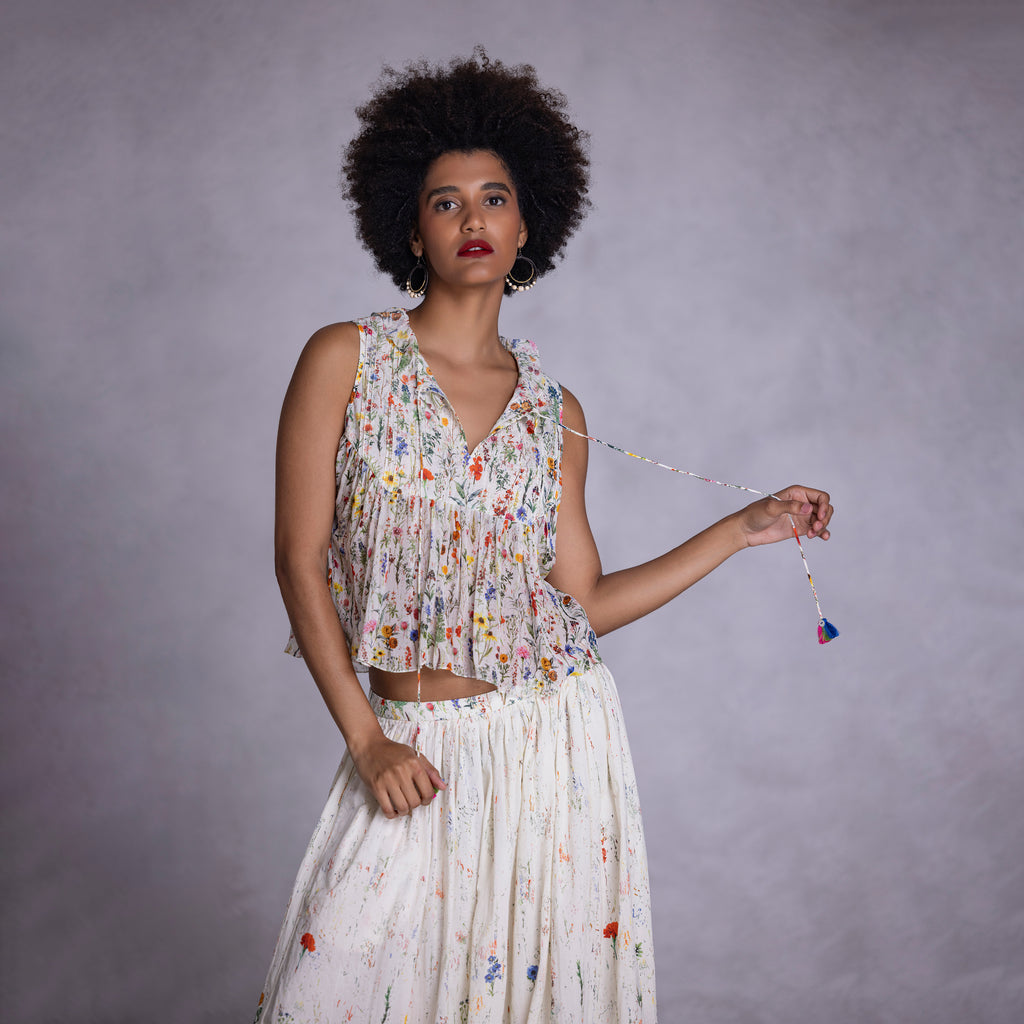  Cambric skirt with side pockets and relaxed fit
